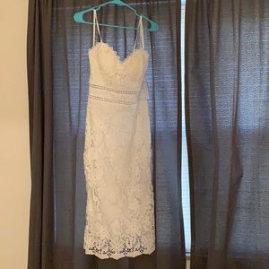Never worn, new with tags. Great for brides!